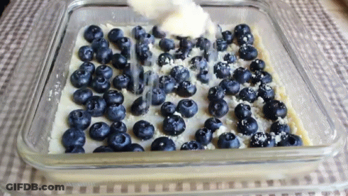 Casserole Dish With Blueberries And Whipped Cream GIF