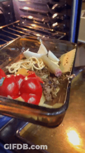 Casserole Dish With Tomatoes Cheese And Meat GIF