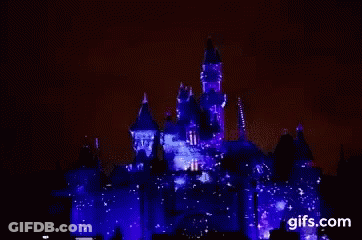 Castle Lit Up With Purple Lights GIF