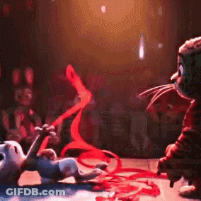 Cat And Rabbit Playing With Red Ribbons GIF