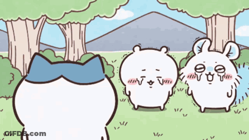 Cat And Two Rabbits In Field GIF