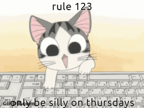 Cat At Keyboard Saying Rule 123 Only Be Silly On Thursdays GIF