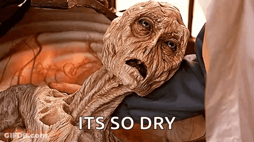 Cat Covering Face With Towel Saying Just Drying Off Now GIF