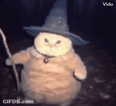 Cat Dressed As Wizard Holding Wand GIF