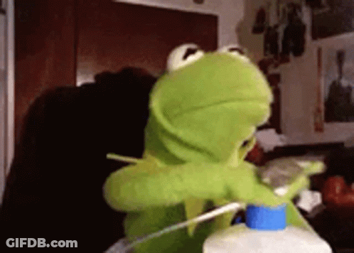 Cat Holding Tube Of Cat Food GIF