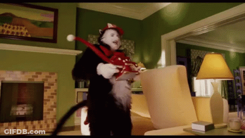 Cat In The Hat Man Holding Cat Toy GIF