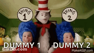 Cat In The Hat Standing Next To Two Dummy Boys GIF