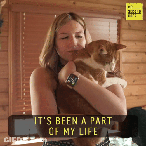 Cat Lady Toting Her Pet GIF