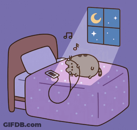 Cat Laying On Bed Listening To Music GIF