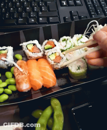 Cat Looking At Sushi Rolls Saying Hi Sushi GIF