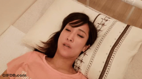 Cat Lying On Bed With Cash GIF