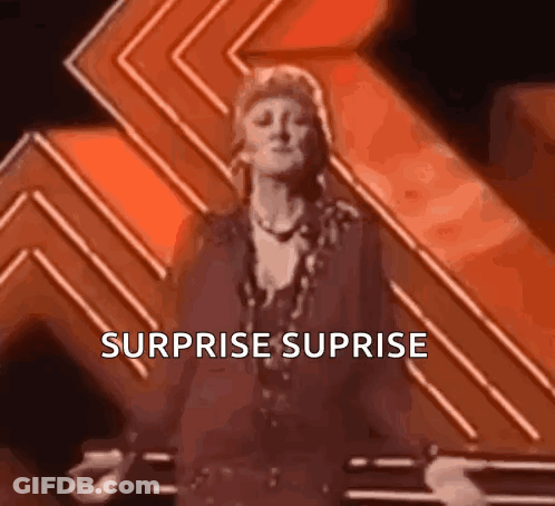Cat Peeking From Blue Gift Box With Surprise GIF