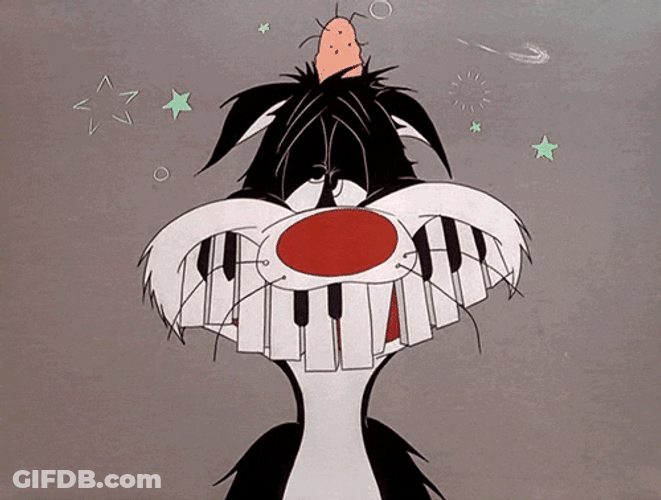 Cat Piano Teeth Falling GIF