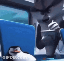 Cat Scratching Itself Beside Door GIF