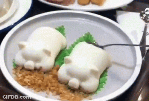 Cat-Shaped Food On Plate With Spoon GIF