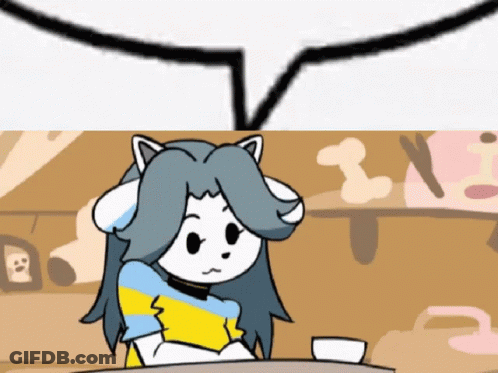 Cat Sitting At Table With Speech Bubble GIF
