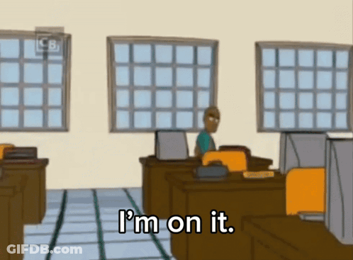 Cat Sitting In Front Of Laptop Saying Im On It GIF