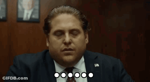 Cat Sitting On Couch Next To Bowl Of Popcorn GIF