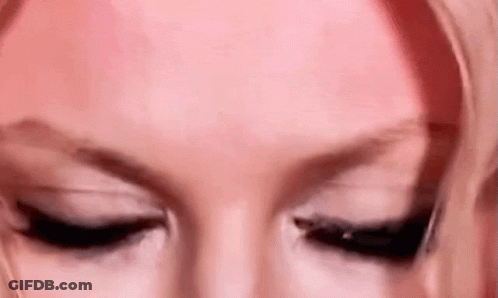 Cat Sitting On Couch With Open Mouth Saying Hala GIF