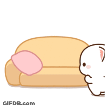 Cat Sitting On Couch With Pink Pillow GIF