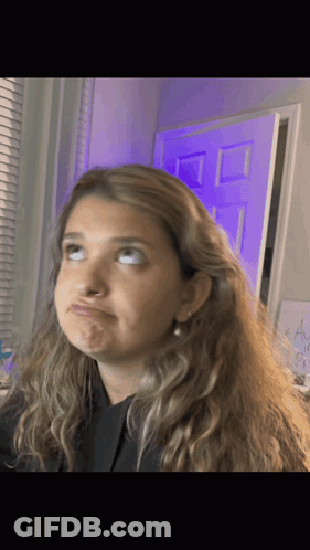 Cat Sitting On Couch With Rude GIF