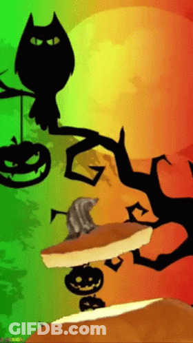 Cat Sitting On Tree Branch With Pumpkin GIF