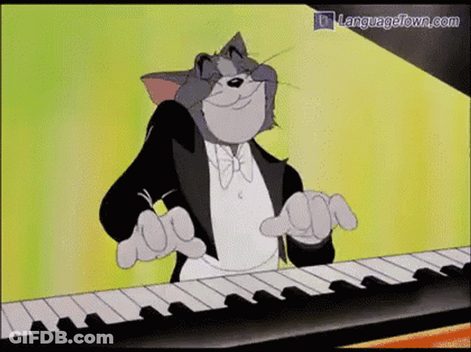Cat Tom Confidently Playing Piano GIF