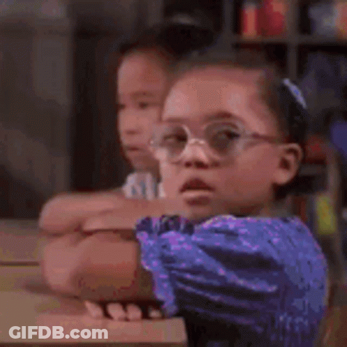 Cat Wearing Glasses Sitting On Chess Board GIF