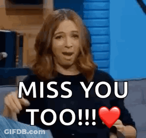 Cat With Big Eyes Lying In Grass Saying I Miss U Too GIF