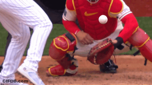 Catcher In Red Nike Uniform Catches Ball GIF