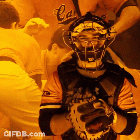 Catcher In Wilson Helmet On Yellow Background GIF