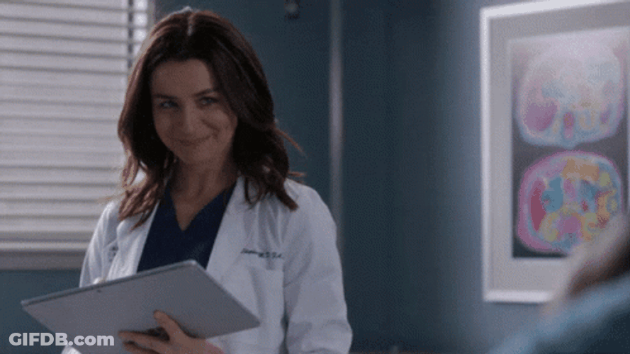 Caterina Scorsone As Amelia Shepherd Taking Notes Smiling GIF