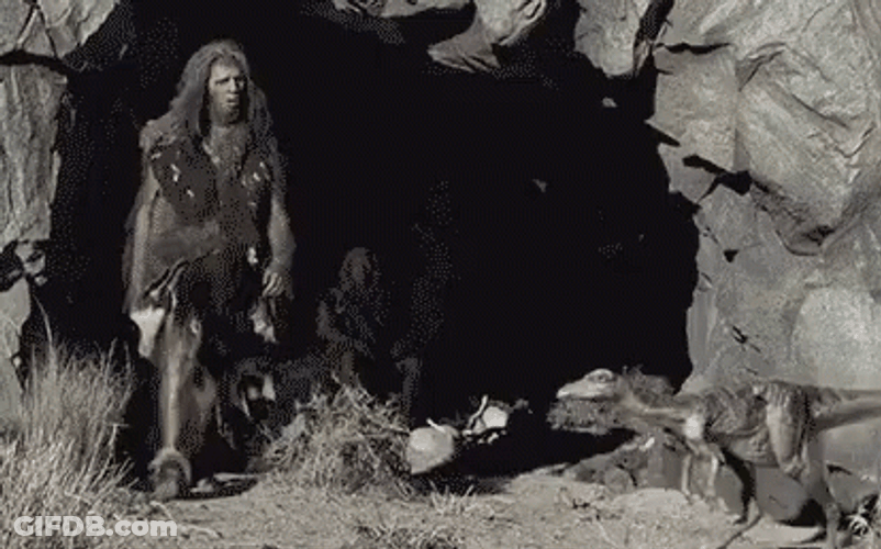 Caveman Kicked The Baby Dinosaur GIF