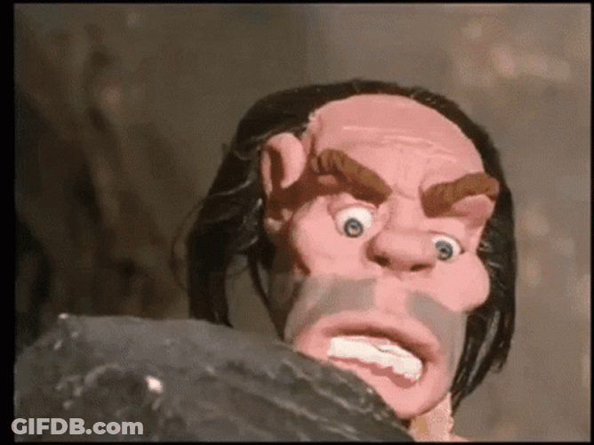 Caveman Startled By Spotted Tarantula GIF