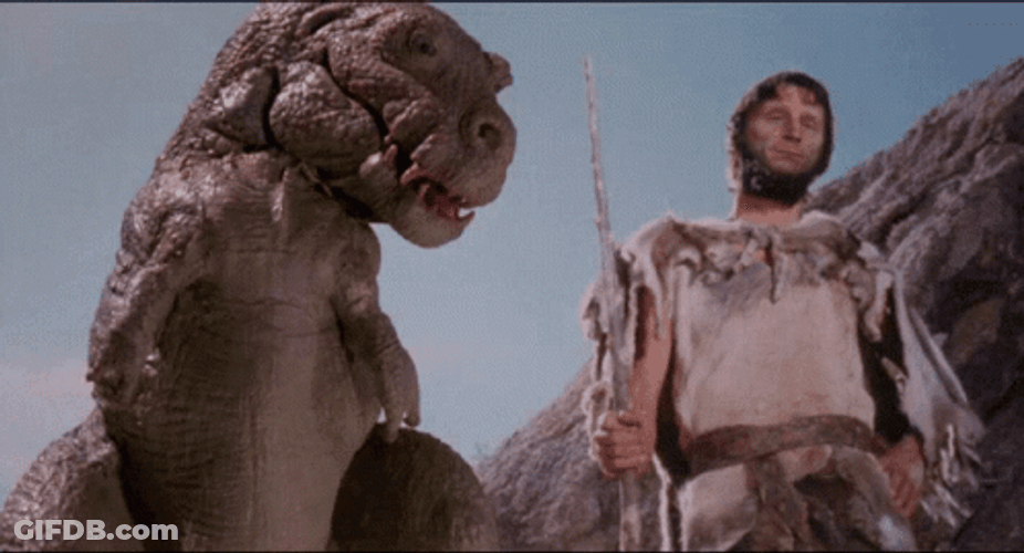 Caveman With Sword And The Licking Dinosaur GIF