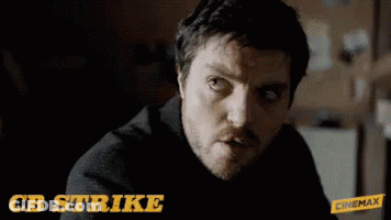 CB Strike Text Above Man's Face GIF