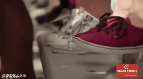 Cedar Pointe Advertisement With Pair Of Red Shoes GIF