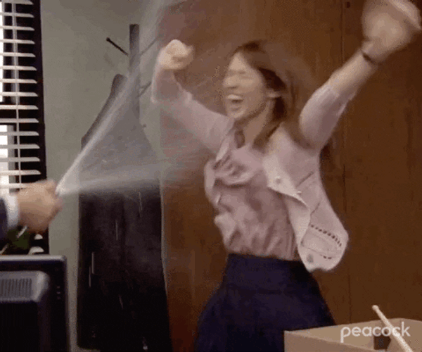Celebrate Champagne Shower Ellie Kemper The Office GIF