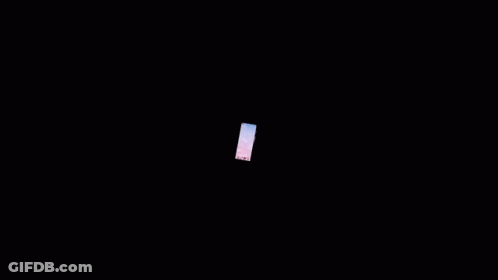 Cell Phone With Pink Sky And Clouds GIF