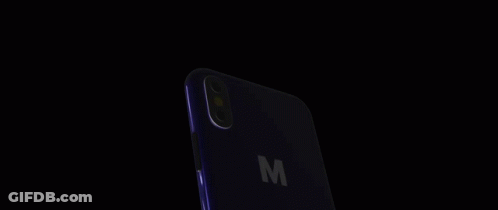 Cell Phone With Pink Sky And Clouds GIF