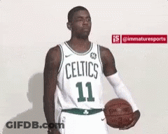 Celtics Player Holding Basketball GIF