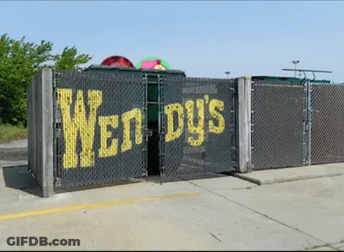 Chain Link Fence With Wendy's Written On It GIF