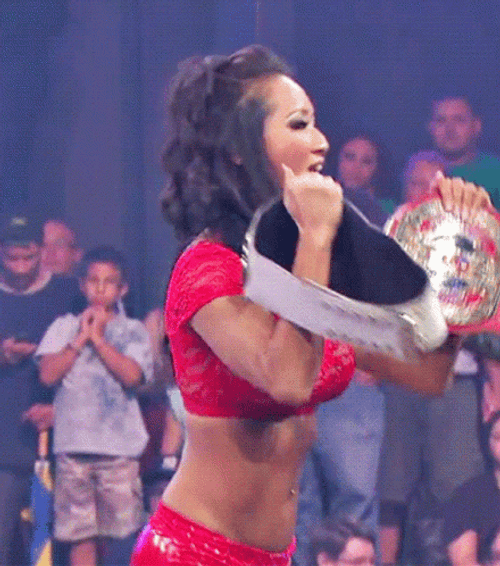 Champ Is Here Gail Kim Showing Two Belts GIF