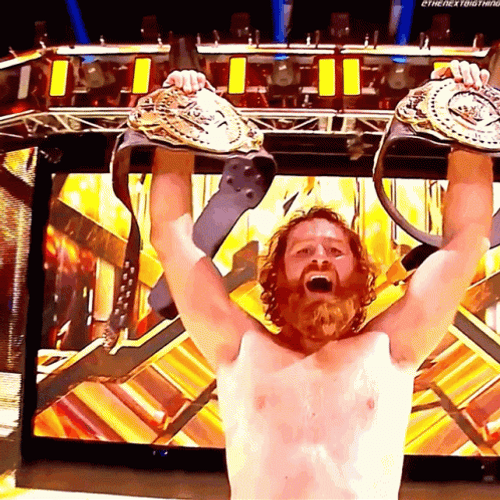 Champ Is Here Sami Zayn Showing Two Belts GIF
