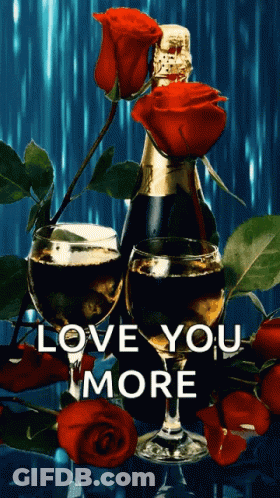 Champagne Bottle Surrounded By Roses And Wine Glasses Love You More GIF