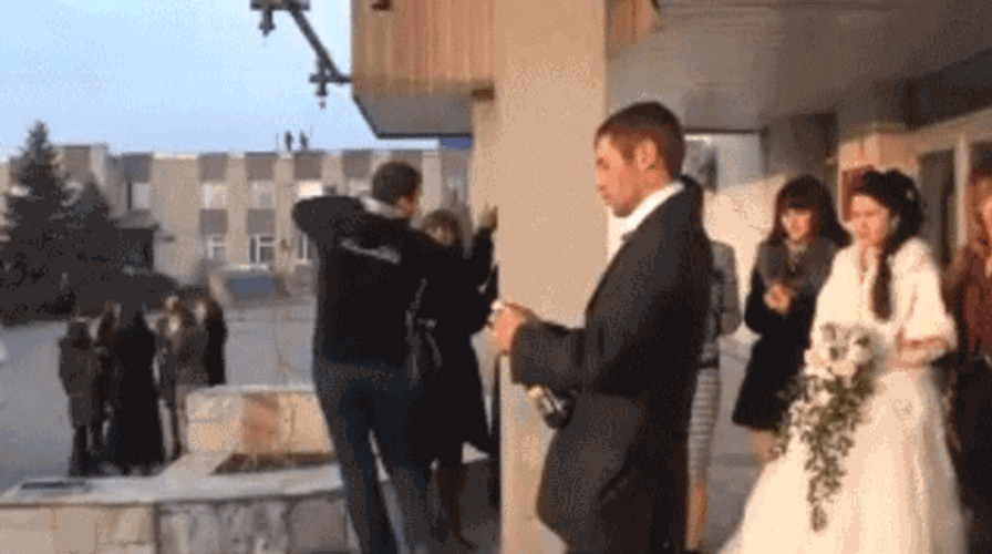 Champagne Popping Cork Fail Funny Wedding GIF
