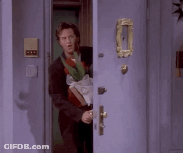 Chandler Bing Bringing Flowers Happy Valentine's Day GIF
