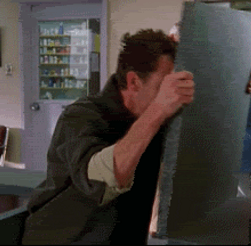 Chandler Bing Headbanging GIF