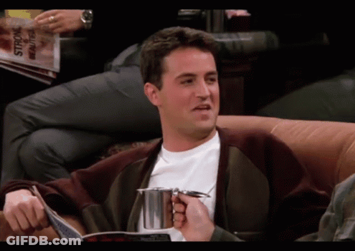 Chandler Bing Reading Sarcastic Laughing GIF