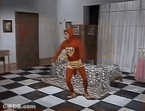 Chapulín Colorado Is Dancing On A Checkered Floor In A Room . GIF